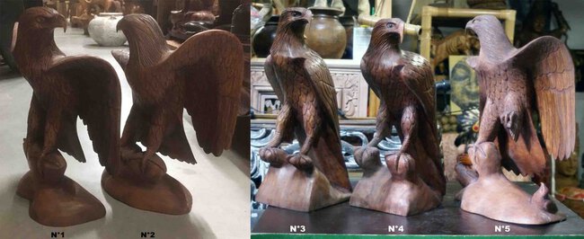 grande statue d'aigle en bois aux ailes déployées