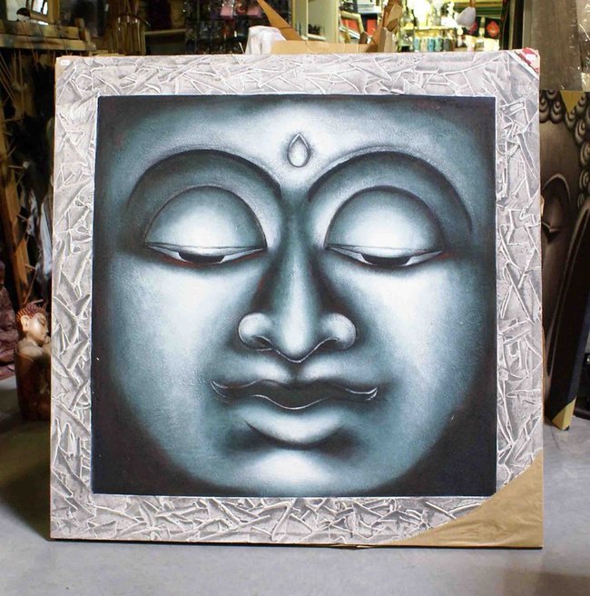 tableau peint d'une tête de Bouddha sur toile tendue