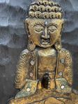 Cadre en bois sculpté et peint d'un Bouddha