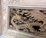 cadre sculpté de dragon et d'un aigle en bois
