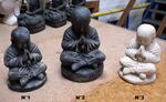 Petites statues de Bouddha assis en pierre de lave intérieur ou extérieur