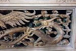 cadre dragon sculpté en bois avec un aigle