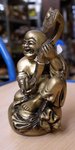 petite statue de Bouddha en bronze avec sitar