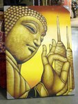 tableau peint d'un Bouddha sur toile
