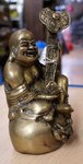 statue de Bouddha en bronze jouant de la sitar