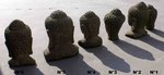 tête de Bouddha sculpté en pierre