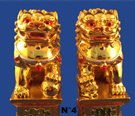 statuette de chien lion doré feng shui