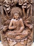Cadre finement sculpté de Bouddha en bois de teck