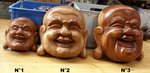 sculpture d'un visage de Bouddha en bois