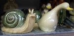 statue escargot ou canard en terre cuite
