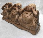 All&eacute;gorie des 3 singes par des statues de Bouddha en bois sculpt&eacute;