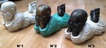 Statue de l'enfant Bouddha allongé en poly-résine