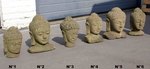 petite tête de Bouddha en pierre pour deco extérieure