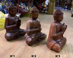 statue de bouddha assis en position du lotus en bois